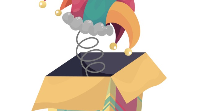 A colorful jack-in-the-box with a jester hat pops out on a spring from a decorative box.